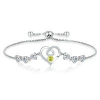 Hand jewelry aquamarine colored gemstone heart bracelet
